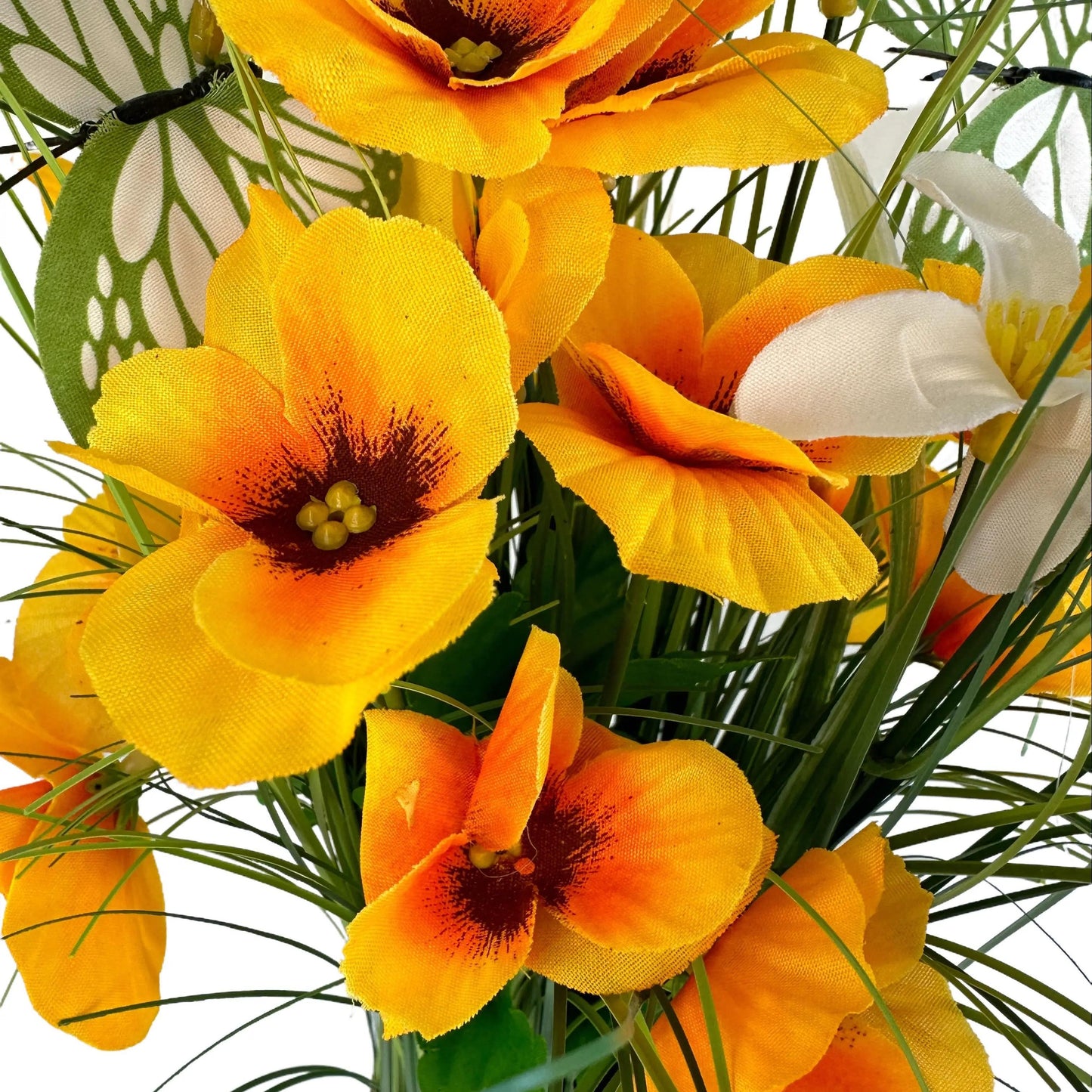 Artificial Grass, Yellow Pansy and Wild Flower Arrangement with Butterflies