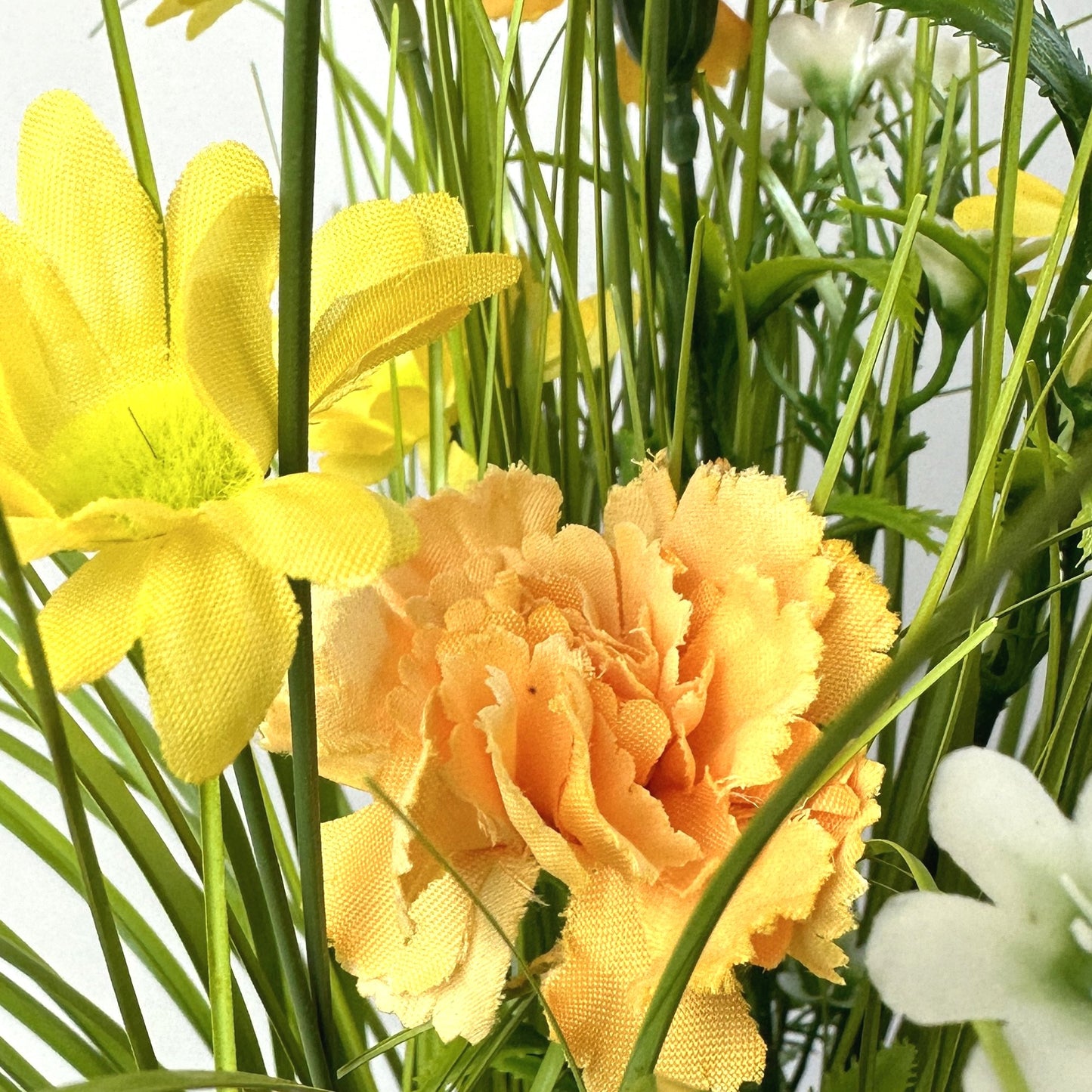 Artificial Grass, Yellow Carnations and Wild Flower Arrangement 57cm