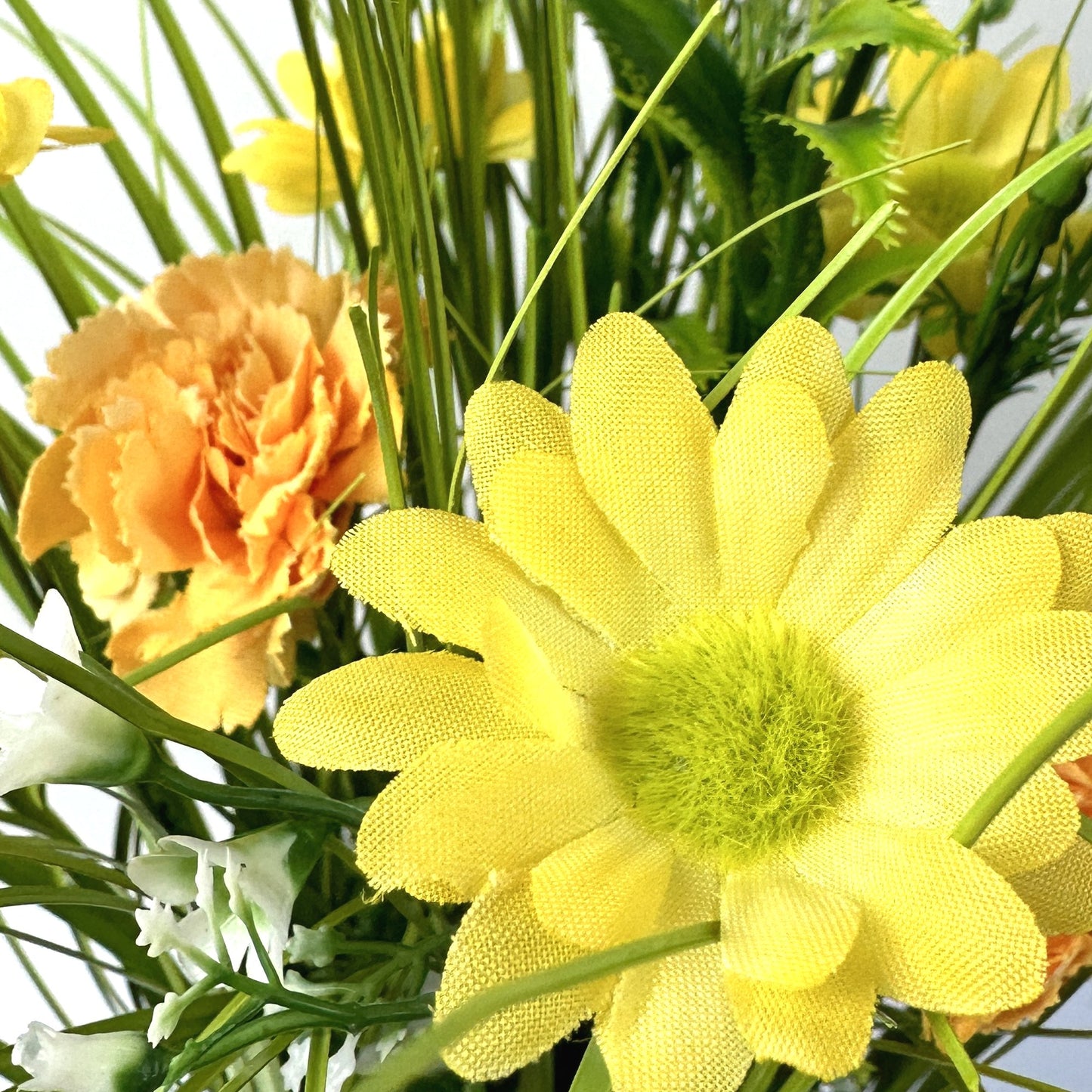 Artificial Grass, Yellow Carnations and Wild Flower Arrangement 57cm