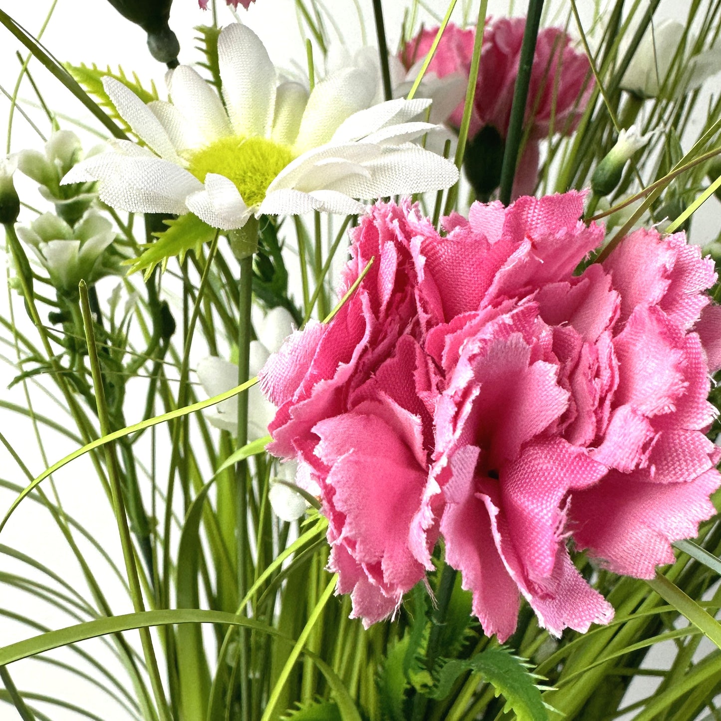 Artificial Grass, Pink Carnations and Wild Flower Arrangement 57cm