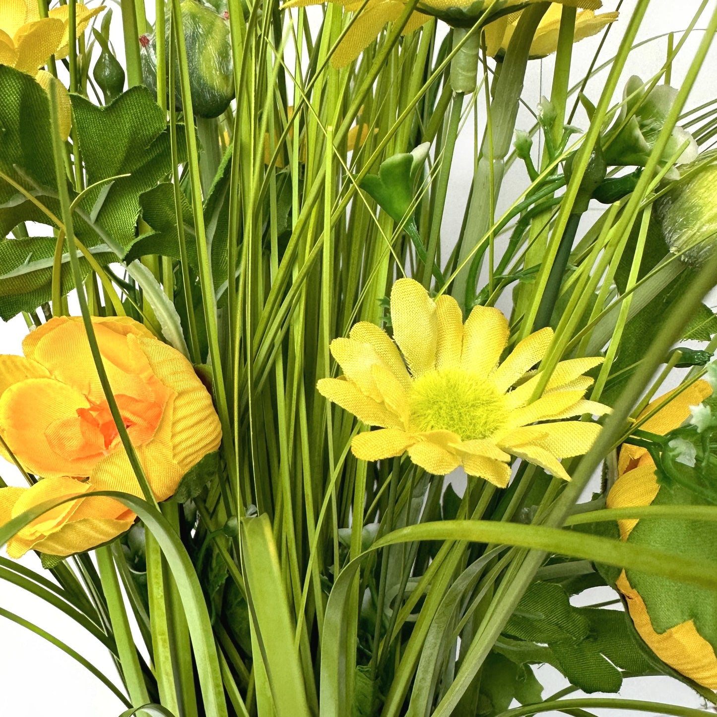 Artificial Grass, Yellow Ranunculus and Wild Flower Arrangement 57cm