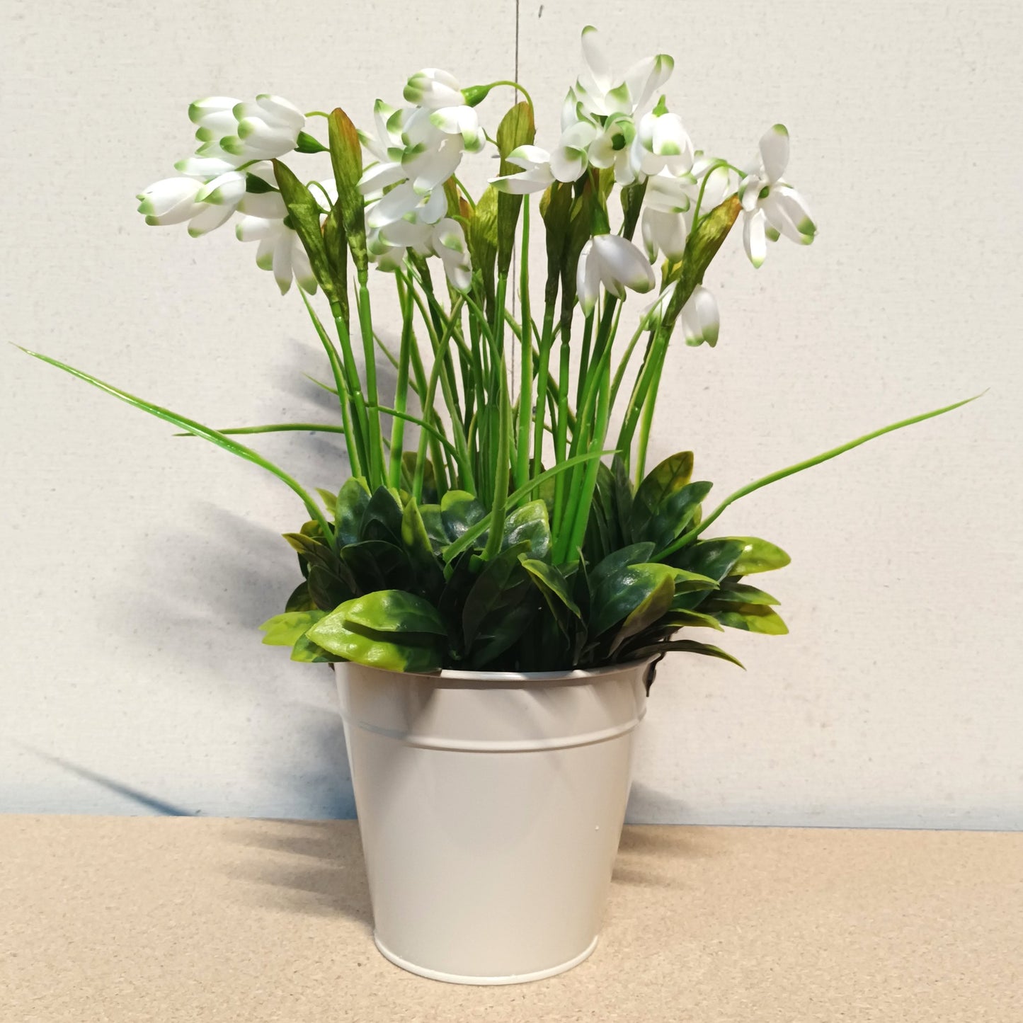 Artificial Snowdrop Flowers in a Cream Metal Bucket Container