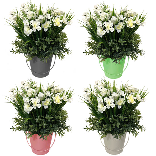 Artificial Grass with White Flowers and Tea Leaf Foliage in a Metal Bucket